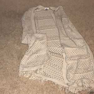 Knee Length, Tank Sweater with fringe.